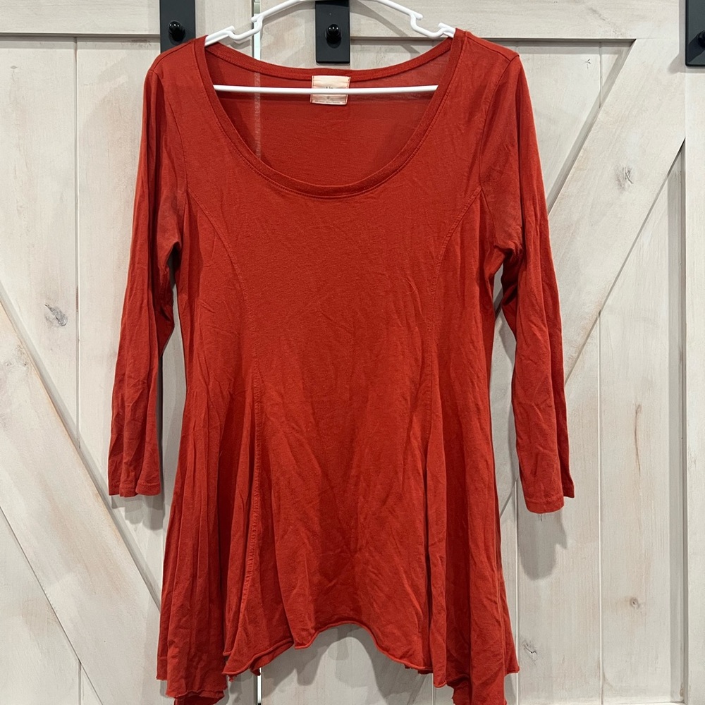 Anthropologie size small burnt orange blouse. Gently used condition.
